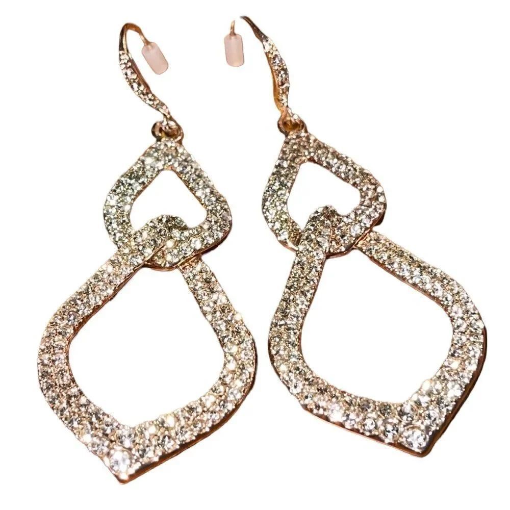 NWOT crystal interlock rose gold drop earring